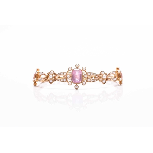 45 - An early 20th century pink tourmaline and seed pearl bracelet, designed as a central octagonal facet... 