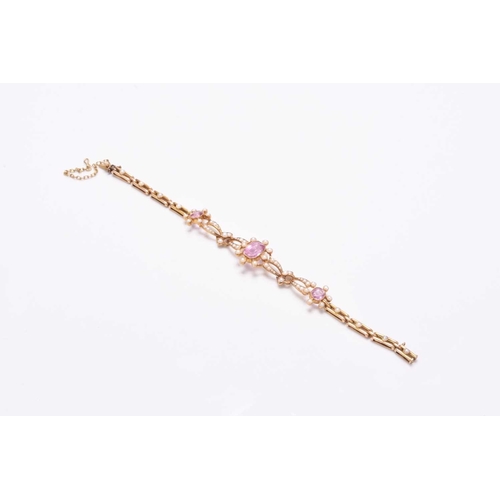 45 - An early 20th century pink tourmaline and seed pearl bracelet, designed as a central octagonal facet... 