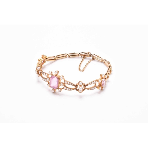 45 - An early 20th century pink tourmaline and seed pearl bracelet, designed as a central octagonal facet... 