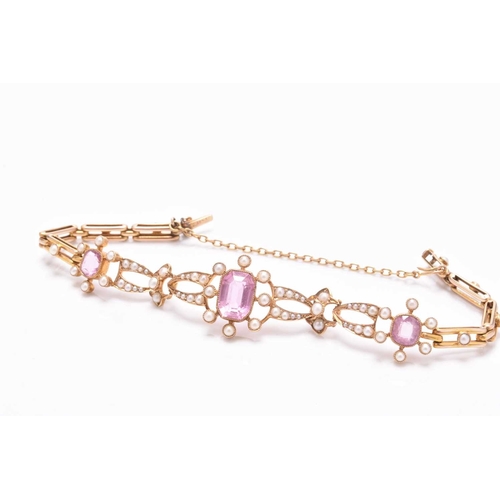 45 - An early 20th century pink tourmaline and seed pearl bracelet, designed as a central octagonal facet... 
