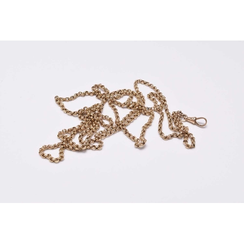 57 - A yellow metal guard chain, with attached swivel stamped '9c', 128cm long, weight approx 29.3g