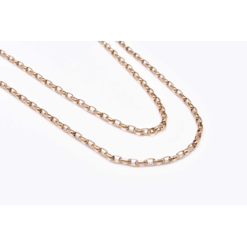 58 - A yellow metal guard chain, with attached swivel stamped '9ct', 62cm long, weight approx 23.3g