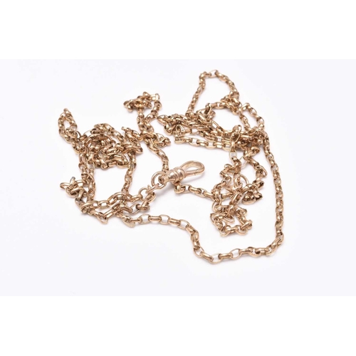 58 - A yellow metal guard chain, with attached swivel stamped '9ct', 62cm long, weight approx 23.3g