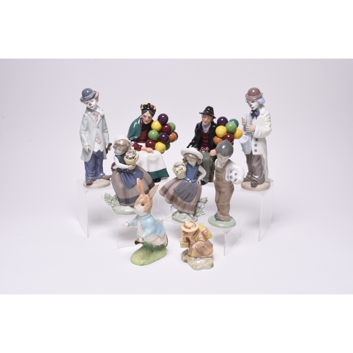 102 - A group of collectable ceramics, 20th century comprising four Lladro models; two girls with baskets ... 