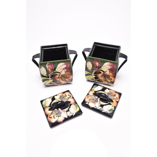 124 - Two contemporary Moorcroft 'Pencarrow' pattern biscuit jars and covers, numbered editions 286 and 33... 