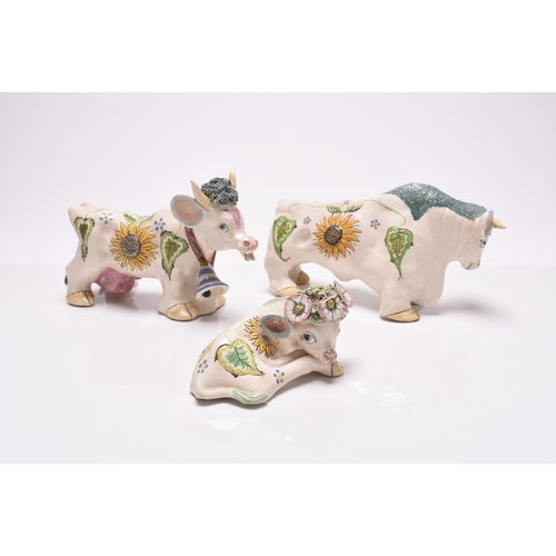 125 - Basil Matthews (1913-1985) - A studio pottery group of three cattle, circa 1950s-60s, comprising bul... 