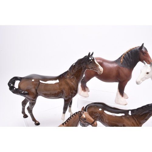 126 - A group of Beswick horses, including a Hackney pony, model H261; a matt glaze Shire Horse, two Hunts... 