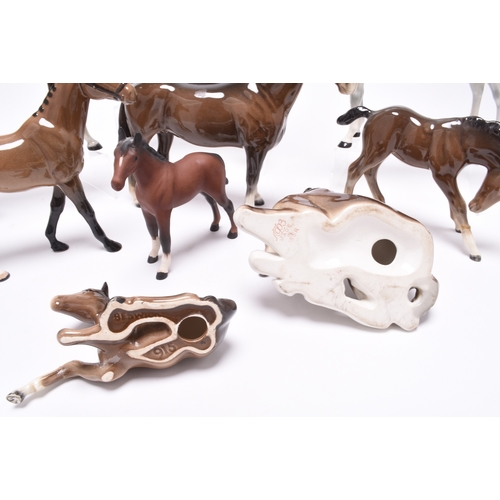 126 - A group of Beswick horses, including a Hackney pony, model H261; a matt glaze Shire Horse, two Hunts... 