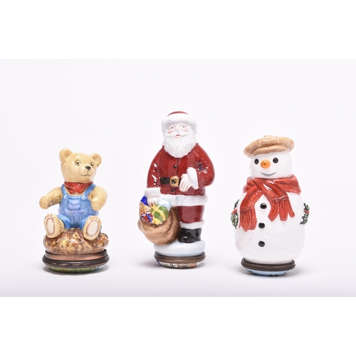 130 - Three Halcyon Days enamel bonbonnieres; comprising Father Christmas, a snowman and a teddy bear, eac... 