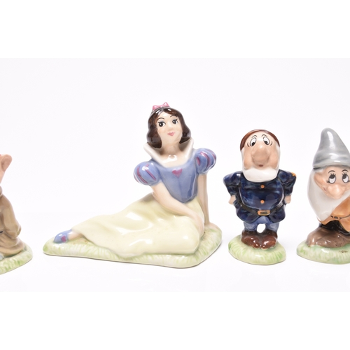 137 - A set of Wade Walt Disney Snow White and the Seven Dwarves figures, printed marks, 8.5cm high (8)