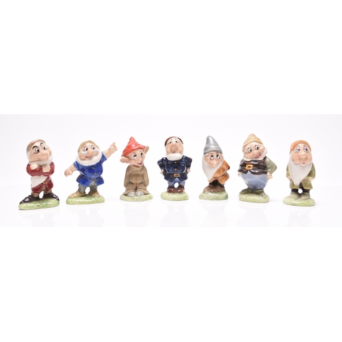 137 - A set of Wade Walt Disney Snow White and the Seven Dwarves figures, printed marks, 8.5cm high (8)