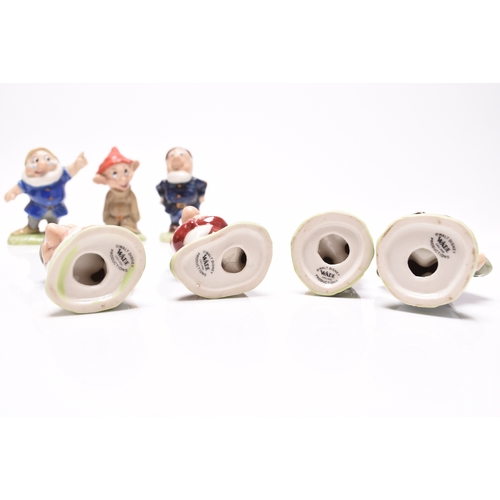 137 - A set of Wade Walt Disney Snow White and the Seven Dwarves figures, printed marks, 8.5cm high (8)