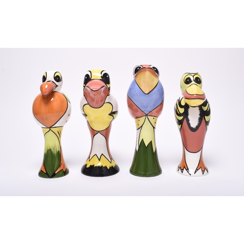 148 - A group of four of Lorna Bailey grotesque bird vases, printed marks and painted signatures, 24.5cm h... 