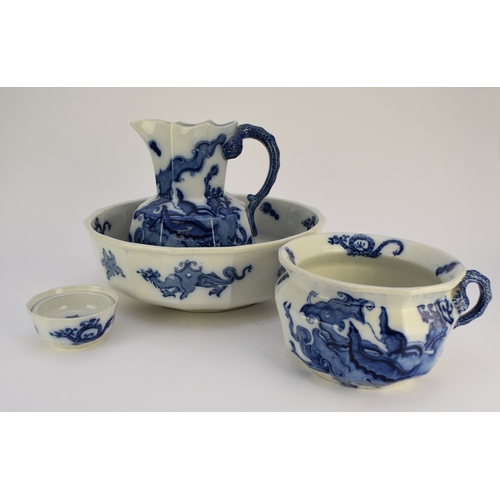 16 - A Mason's Ironstone 'Blue Dragon' toilet set, 19th century, transfer-printed in underglaze blue, com... 