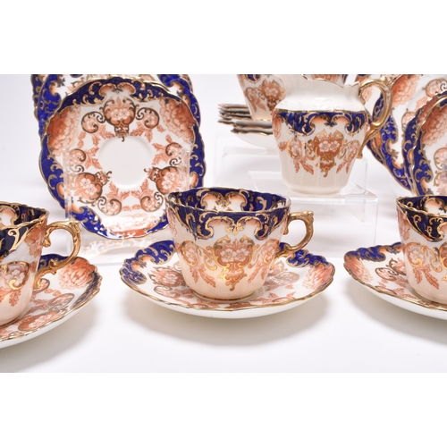 17 - An Edwardian Aynsley part tea service, circa 1900-1910, transfer-printed in underglaze red and blue ... 