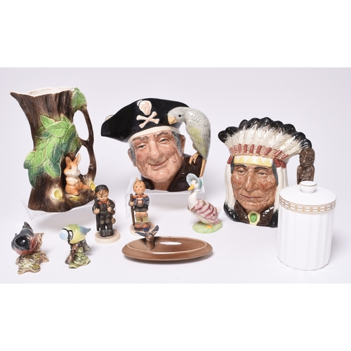 187 - A mixed lot of collectable ceramics, comprising two Royal Doulton large character jugs of 'Long John... 