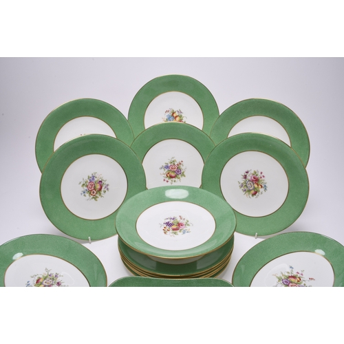 188 - A Wedgwood bone china dessert service, mid-20th century, pattern W2010, centrally painted with fruit... 