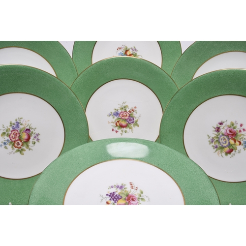 188 - A Wedgwood bone china dessert service, mid-20th century, pattern W2010, centrally painted with fruit... 