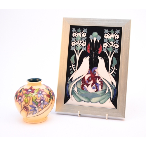 190 - A Moorcroft rectangular 'Hidden Heart' plaque, dated 2015, tubelined with a pair of birds and foliag... 