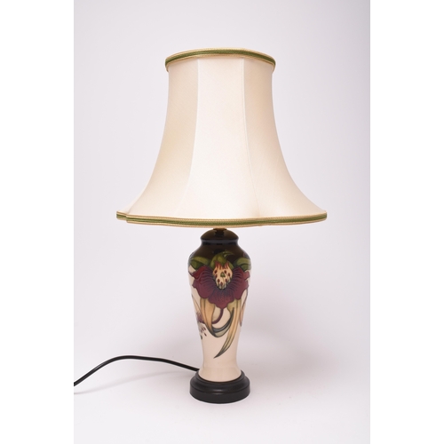 209 - A Moorcroft 'Anna Lily' table lamp, 21st century, with original Moorcroft shade, of tall, slender fo... 