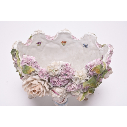 215 - A group of Continental porcelain, late 19th and 20th centuries, comprising a group of Dresden style ... 