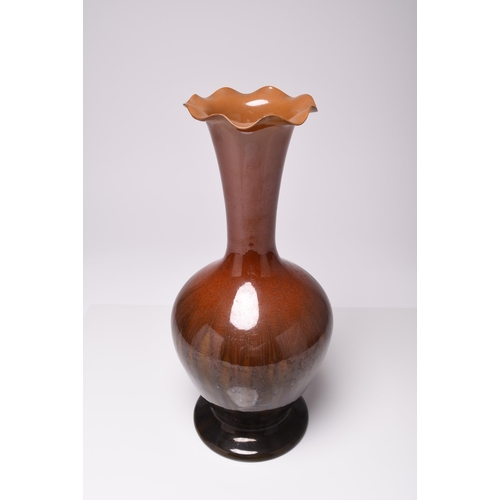 30 - A large Linthorpe art pottery vase, no. 2224, late 19th century, with undulated rim, red to brown gl... 