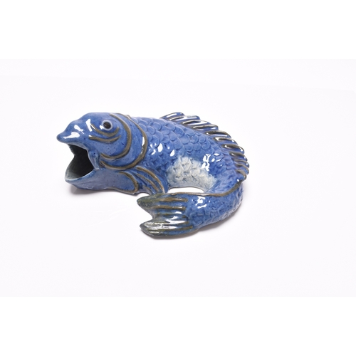 37 - Two Barnstaple art pottery wall pockets in the form of fish, late 19th century, comprising Alexander... 