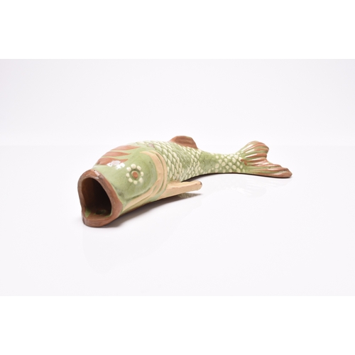 37 - Two Barnstaple art pottery wall pockets in the form of fish, late 19th century, comprising Alexander... 