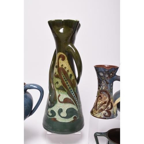 41 - A collection of Barnstaple art pottery, predominantly CH Brannam and Baron, late 19th and early 20th... 