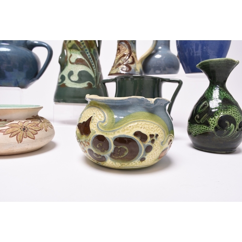 41 - A collection of Barnstaple art pottery, predominantly CH Brannam and Baron, late 19th and early 20th... 