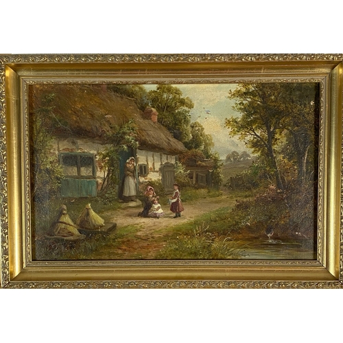 445 - Thomas Stevens (19th - 20th Century) A mother and children outside a country cottage, signed lower l... 