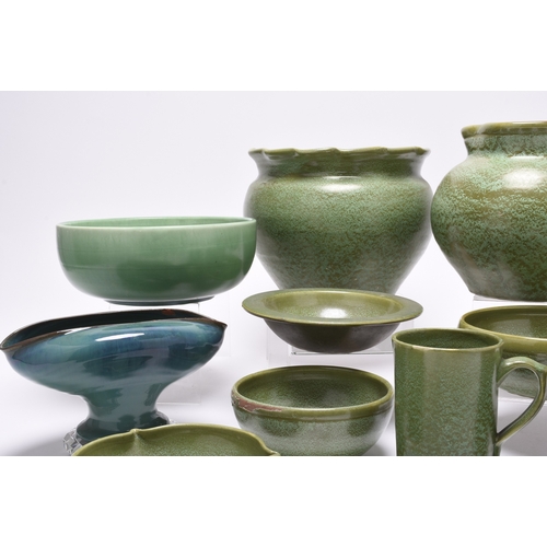 52 - C H Brannam (Barum, Barnstaple) - A collection of matt green glazed art pottery, late 19th and early... 