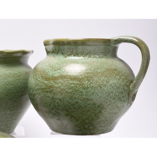 52 - C H Brannam (Barum, Barnstaple) - A collection of matt green glazed art pottery, late 19th and early... 