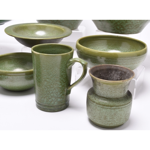 52 - C H Brannam (Barum, Barnstaple) - A collection of matt green glazed art pottery, late 19th and early... 