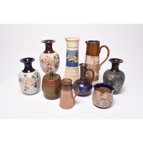 54 - A collection of British pottery, late 19th and early 20th century, principally stoneware, including ... 