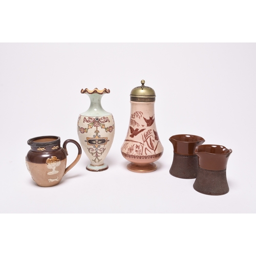 54 - A collection of British pottery, late 19th and early 20th century, principally stoneware, including ... 