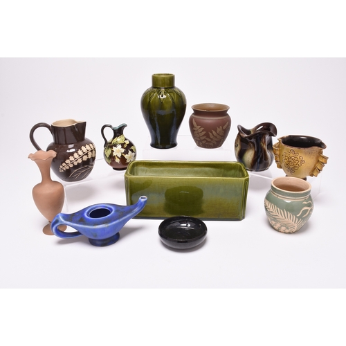 58 - An interesting collection of British art pottery, predominantly circa 1890-1930, including a Bretby ... 