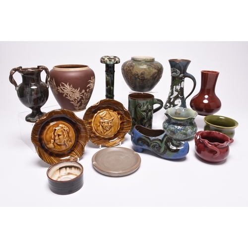 59 - A collection of British art pottery, circa 1880-1930, including a group of C H Brannam (Barnstaple):... 