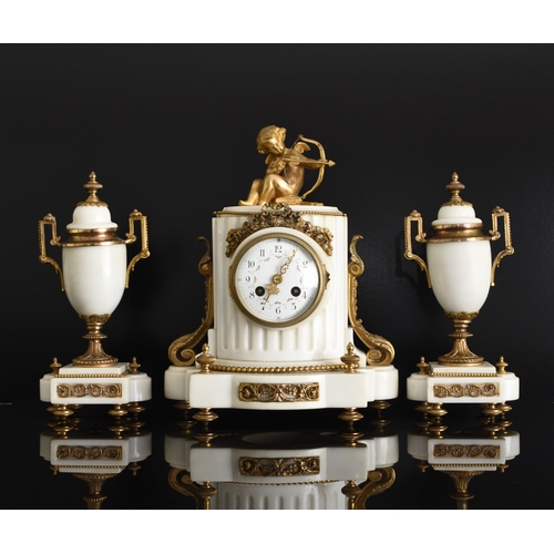 598 - A French white marble and ormolu clock garniture Late 19th century, the rectangular case mounted wit... 