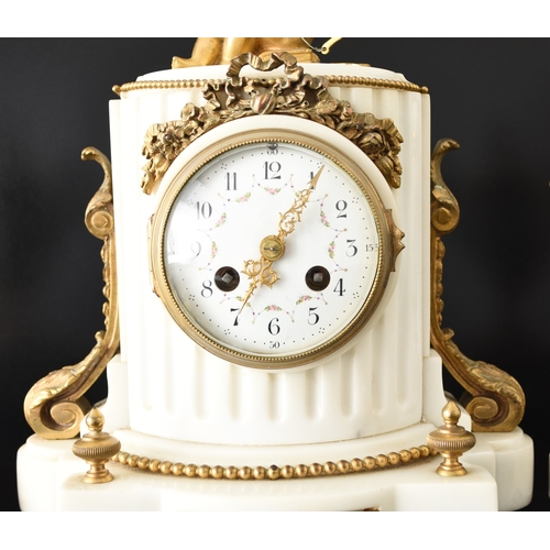 598 - A French white marble and ormolu clock garniture Late 19th century, the rectangular case mounted wit... 