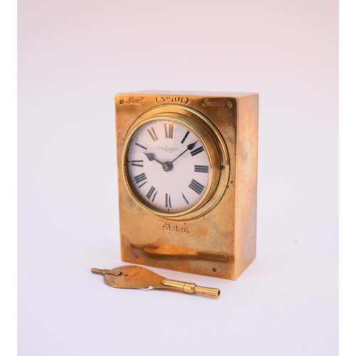 602 - An unusual 19th century brass timepiece by Alexander Smart, London The plain polished case signed Al... 