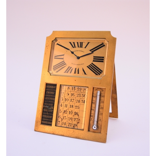 603 - An Art Deco-style gilt metal combination desk clock The 3.5 inch rectangular dial with black Roman c... 