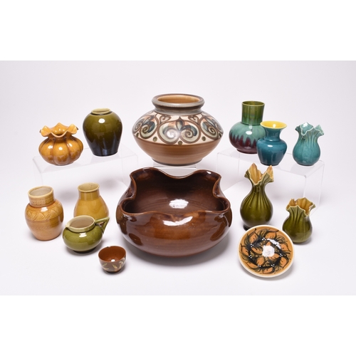 61 - A collection of Linthorpe art pottery, late 19th century, including a small mustard glaze vase, shap... 