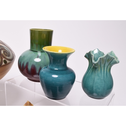 61 - A collection of Linthorpe art pottery, late 19th century, including a small mustard glaze vase, shap... 