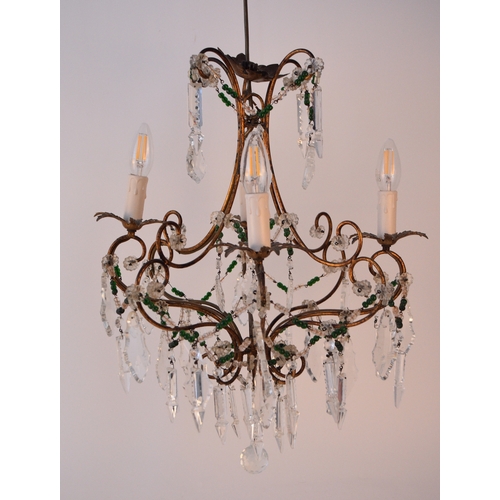 610 - A pair of Venetian glass and gilt metal chandeliers Mid 20th century, with eight scroll branches, fo... 