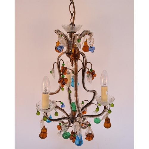 611 - A Venetian coloured glass and gilt metal chandelier The six branches, three with lamp heads, applied... 