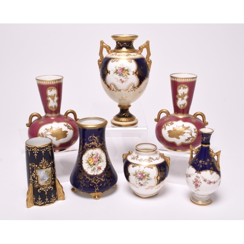 64 - A group of small Coalport vases, late 19th and early 20th century, comprising an unusual Aesthetic M... 