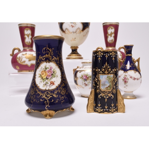 64 - A group of small Coalport vases, late 19th and early 20th century, comprising an unusual Aesthetic M... 