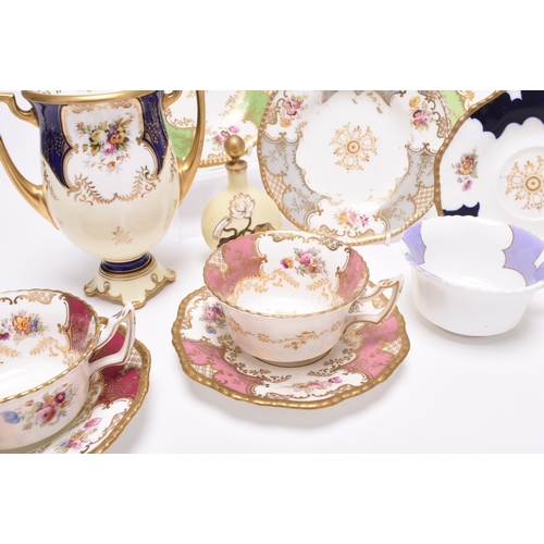 69 - An assembled group of Coalport, comprising batwing teawares: a scarce grey teacup, saucer and three ... 