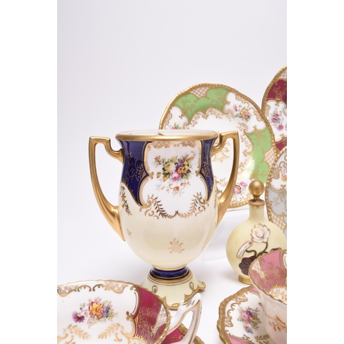 69 - An assembled group of Coalport, comprising batwing teawares: a scarce grey teacup, saucer and three ... 